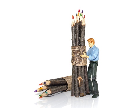 original wooden pencils in green orange and yellowの写真素材