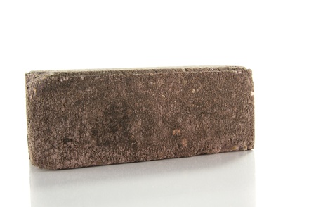 one single concrete stone isolated on whiteの写真素材