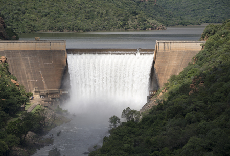 the swadini dam with waterfall in the blyde river south africa の写真素材