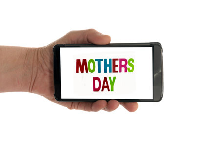 female hand with mobile phone isolated on white with mothers dayの写真素材