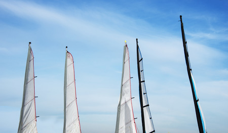 set of different sails for watersport on the beachの写真素材