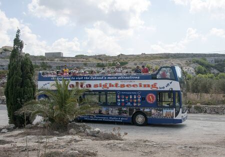 VALETTA,MALTA-AUGUST 29, 2011: People enjoy vacation on the island Malta in the bus, on August 29 2011, the bus is sightseeing bus that tours around the island for touristsのeditorial素材