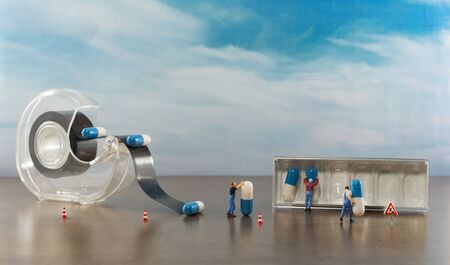 little world puppets busy with anti zigga virus medicinesの写真素材