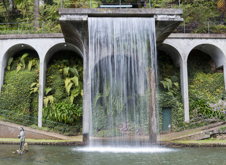 Waterfall in the tropican Monte Palace Garden. Funchal, Madeira, Portugal.のeditorial素材