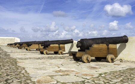 old rusty cannons on the castle walls at Sagres Portugal