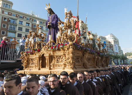 MALAGA,SPAIN-APRIL 09 2017:Unidentified people walking in the catholic processions called Semena Santa in Malaga on April 09 2017, this processions are every year the sunday before easterのeditorial素材