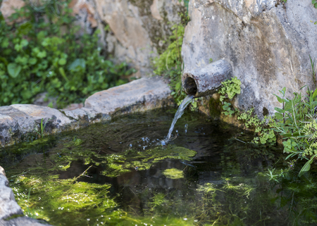 fresh drinking water from a top in the mountains of andalusiaの写真素材