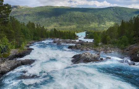 waterfall and rocks in norway near geiranger otta riverの写真素材