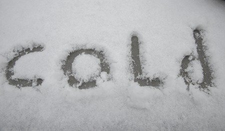 cold text in snowの写真素材
