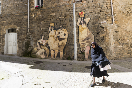 woman walking in the streets of morgosoloのeditorial素材