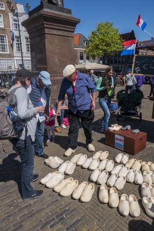 clog maker selling wooden shoes