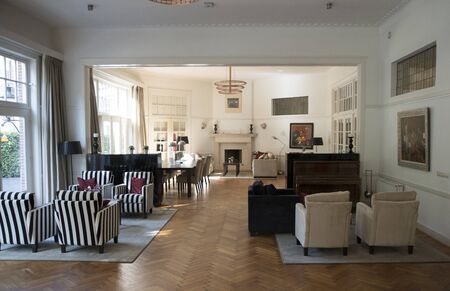 Apeldoorn,Holland,14-spet-2019: exclusive interior of the dining room from a hotel with paintings on...