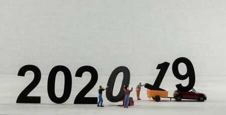 little people working at the new 2020 and remove the 2019 lettersの写真素材