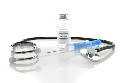 Coronavirus vaccine vial with injection syringe and stethoscope isolated on white backgroundの写真素材