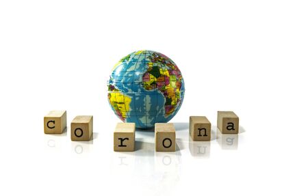 Covid 19 virus conceptual image with text in black om white around the globeの写真素材