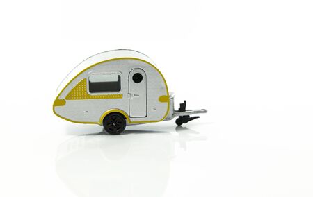 caravan for vacation on camping ground isolated on white backgroundの写真素材