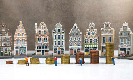 stacks of money coins to show the house prices keep risingの写真素材