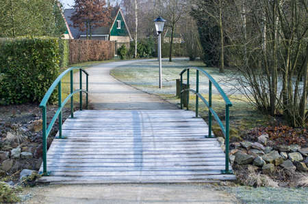 bridge over river in parkの写真素材