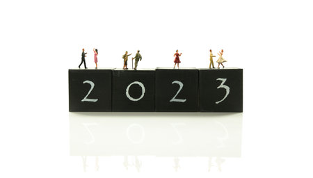 2023 with dancing couples and single figurineの写真素材