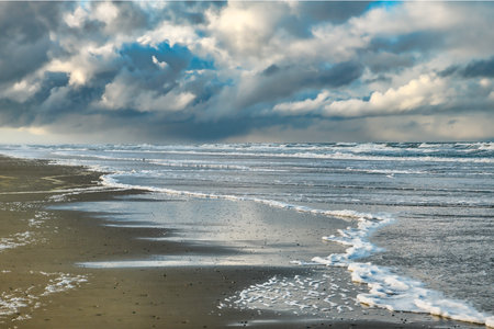 the sand on the beach and sky and Horizon in the backgroundの写真素材