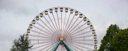 a ferris wheel with a claer sky backgroundの写真素材