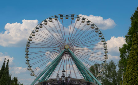 a ferris wheel with a claer sky backgroundの写真素材