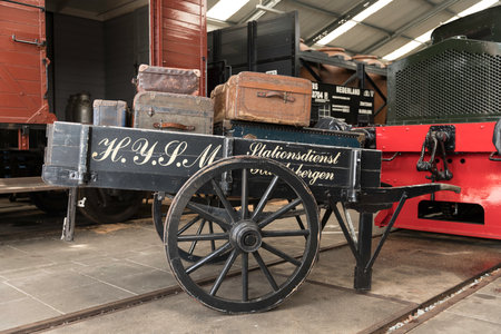 Old wooden car used to transport postal parcels at the train stationの写真素材