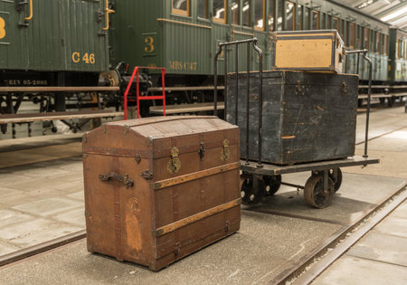 Old wooden car used to transport postal parcels at the train stationの写真素材