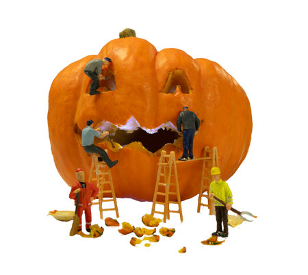 little world miniatures preparing the pumpkins for the hallo ween partyの写真素材