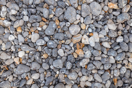 background of different types of gravel and gravel and mainly light gray and brownの写真素材