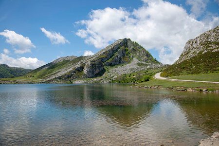 the enollake one of the two Lakes of the Lakes of Covadolga at an altitude of 1134 meters in the Picos de Europa mountains in Spainの写真素材