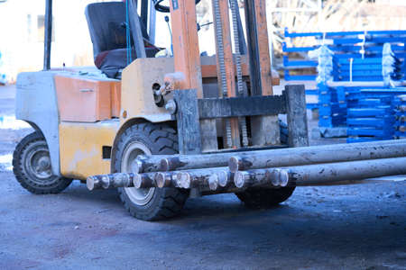 Old forklift machine with clean sandblasted tubes . High quality photoの写真素材