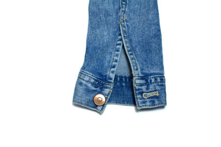 Denim jacket sleeve on a white backgroundの写真素材