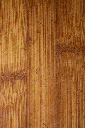 Bamboo Wooden Board Rugged With A Knife Closeupの写真素材