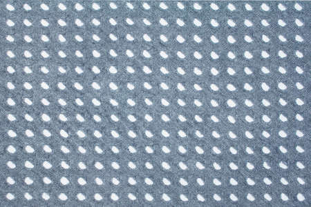 Natural material background made of oval holesの写真素材