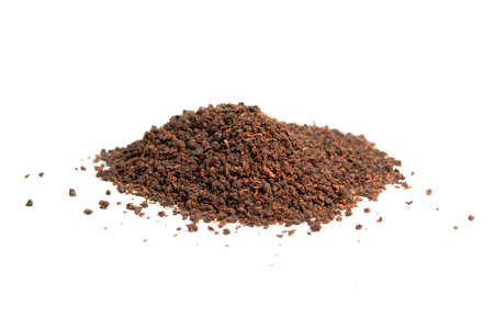 Black granular tea on a white backgroundの写真素材