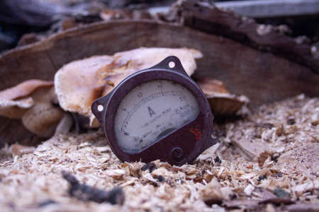 Close up of analog ammeter on the wood backgroundの写真素材