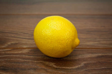 Lemon citrus healthy product on a woody background close up delicious fruit isolatedの写真素材