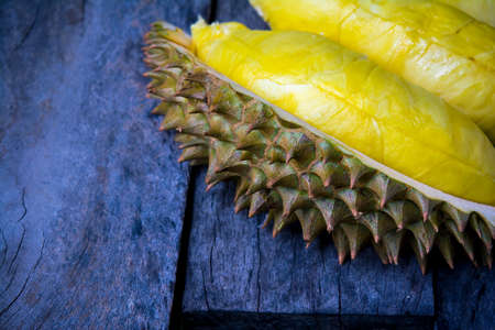 Yellow durian on the woodの写真素材