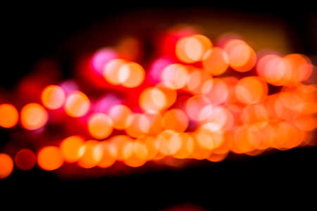 glitter vintage lights background. dark gold and black. defocusedの写真素材