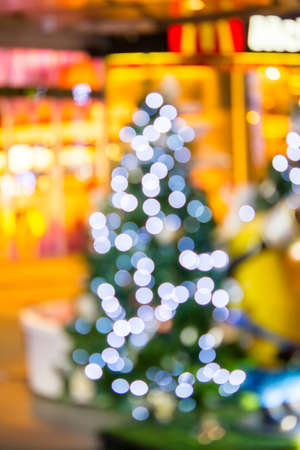Abstract blurred  christmas tree in the shopping mallの写真素材