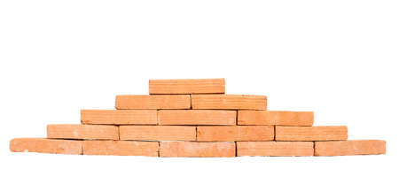 Stack of red bricks isolated on white backgroundの写真素材