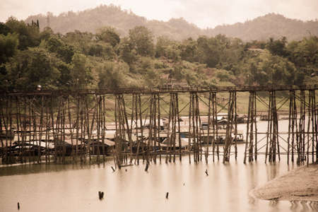 Mon wood bridge, across river , songkalia river, Sangkhlaburi Kanchanaburi, Thailandの写真素材