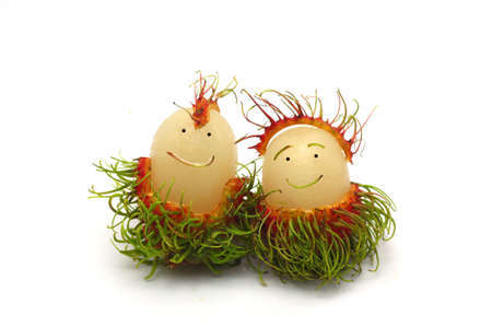 Couple rambutan on white backgroundの写真素材