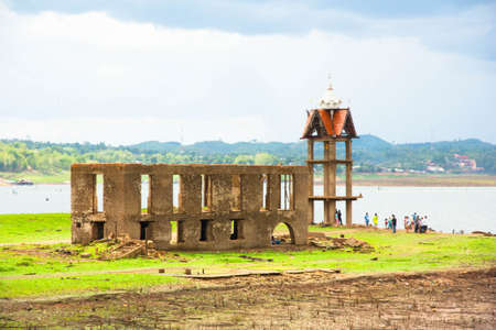 ancient temple expose from river dry, sangkhlaburi, thailandの写真素材
