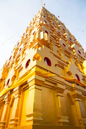 golden pagoda at buddhist temple in Kanchanaburi Province, Thailandの写真素材