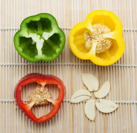 bell peppers on wood background