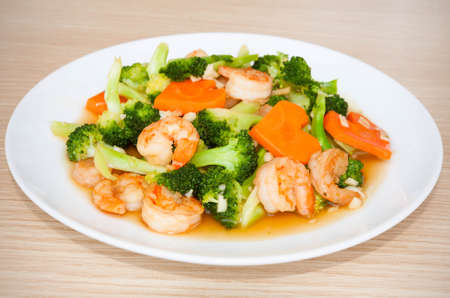 Shrimp stir-fried broccoli with carrot, Thai foodの写真素材