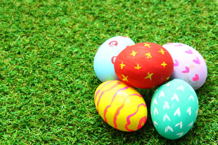 Easter eggs on grass background
