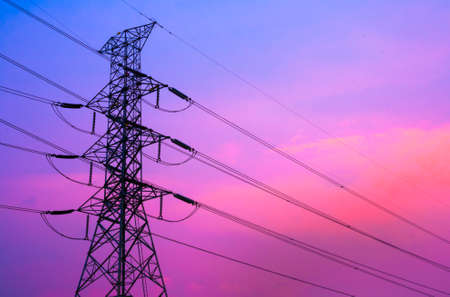 High voltage post and sky in twilight timeの写真素材